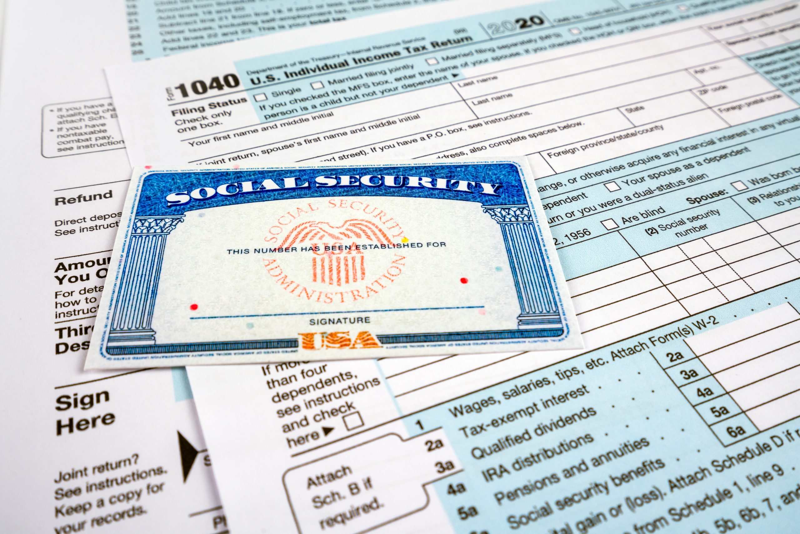 A social security card lay on top of some tax documents